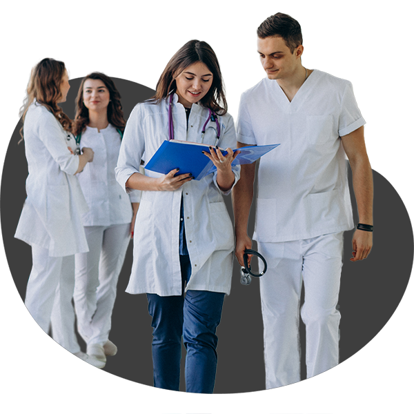 Providers walking and discussing medical files, showing Vee Healthtek’s commitment to empowering healthcare organizations with quality, accuracy, and value